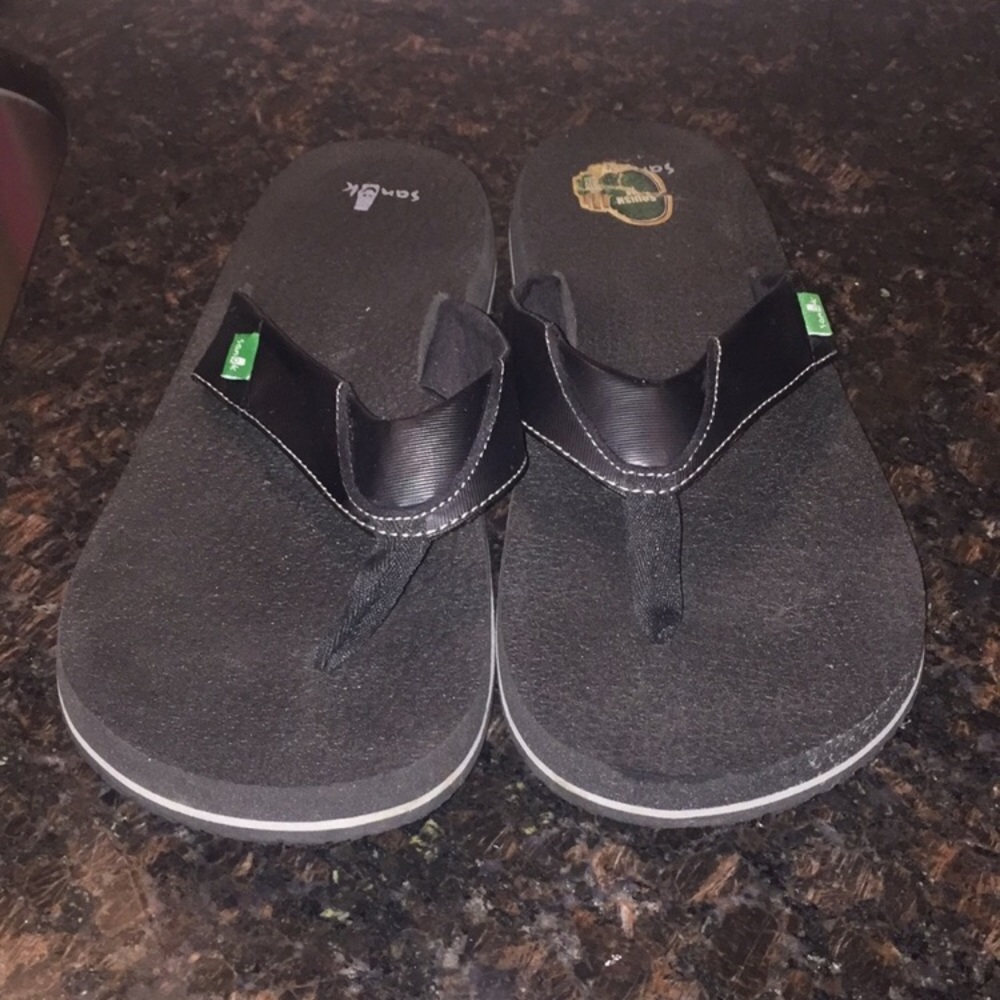 Men’s Sanuk flip flops size 14.